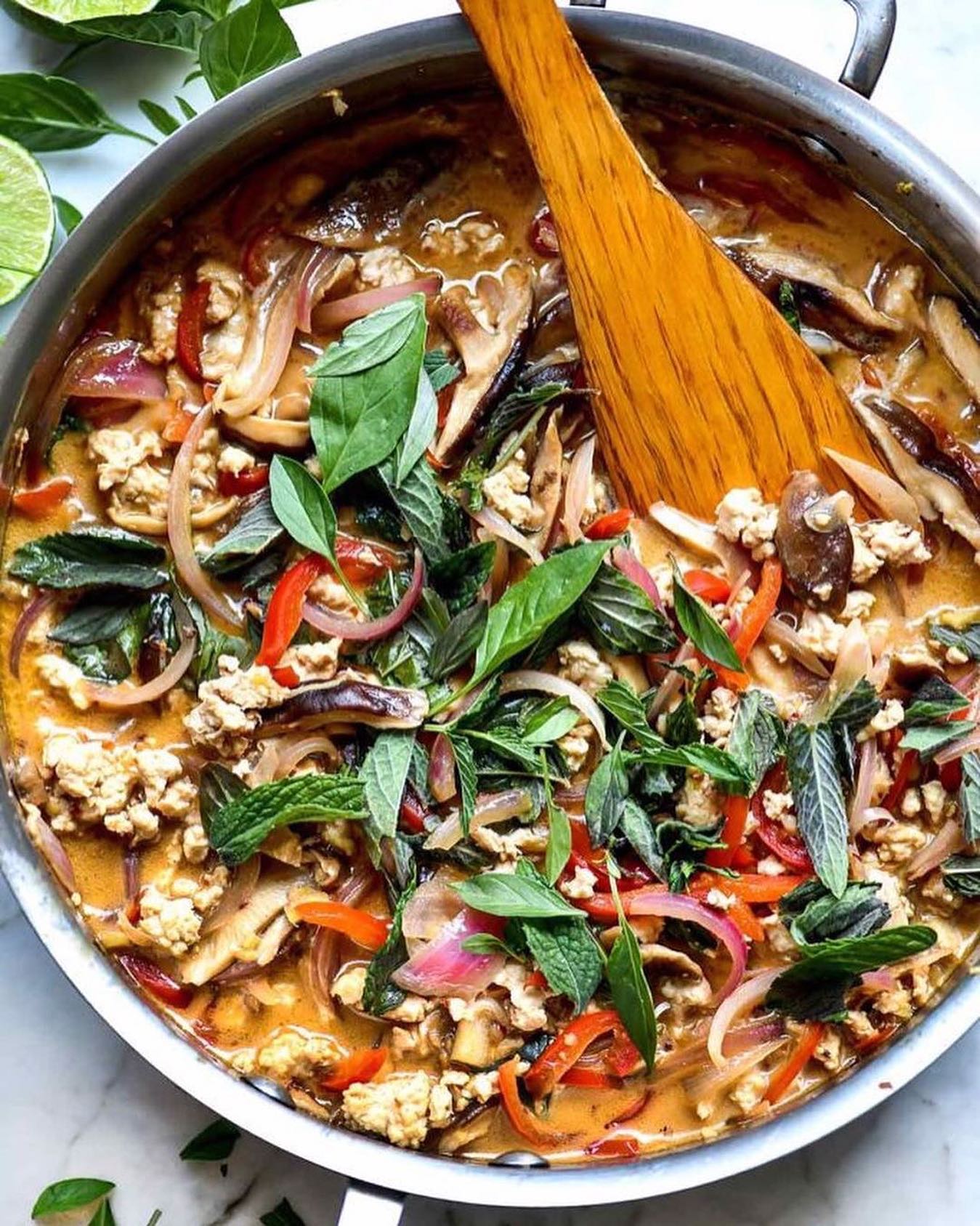 Follow @pdrecipes • @foodiecrush Every year I grow Thai basil just so I can make this Thai basil chicken recipe. Simmered in a lush coconut sauce spiced with Thai chili paste, the ground chicken, red bell peppers, mushrooms, and onion take on all the delicious Thai flavors. Serve it over rice or noodles or why not both. With frost soon in the forecast, it's on repeat at our house and I made it last night for my Instagram stories too. Tap the link in my profile and search Thai basil chicken for the recipe. 

#foodiecrush #foodiecrusheats #thaibasil #thaifood #dinnerwithfriends #garden #madeinblue #foodie #foodlover #foodporn #foodphotography #yummy #instaplace #mysofia #goodvibes #mondaymood #flatlay #flatlayforever #flatlayoftheday #goodvibes #tableview #colours #instacolours #salad #vegetables #foody #photooftheday